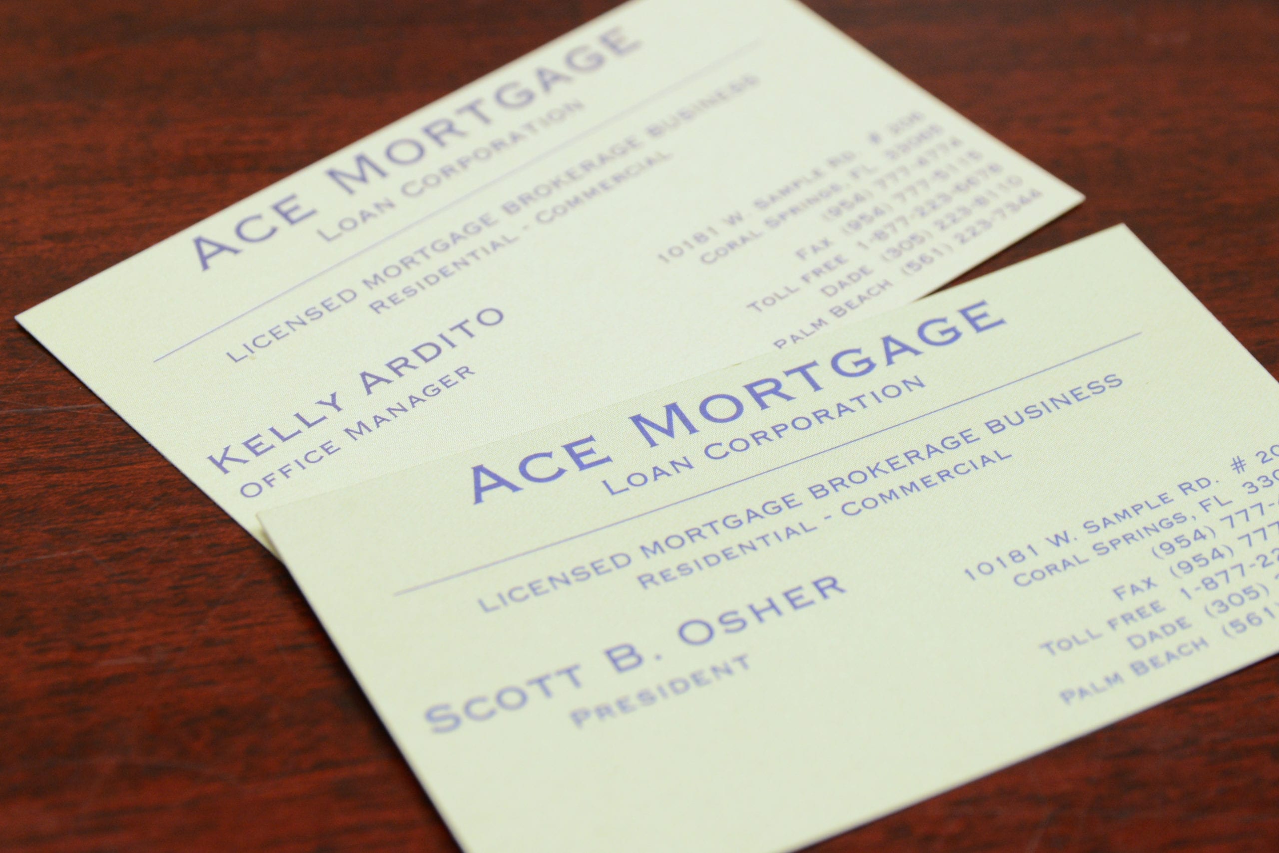 Couple meeting with a mortgage advisor at a desk with paperwork