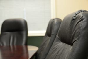 Professional advisor discussing mortgage options with clients