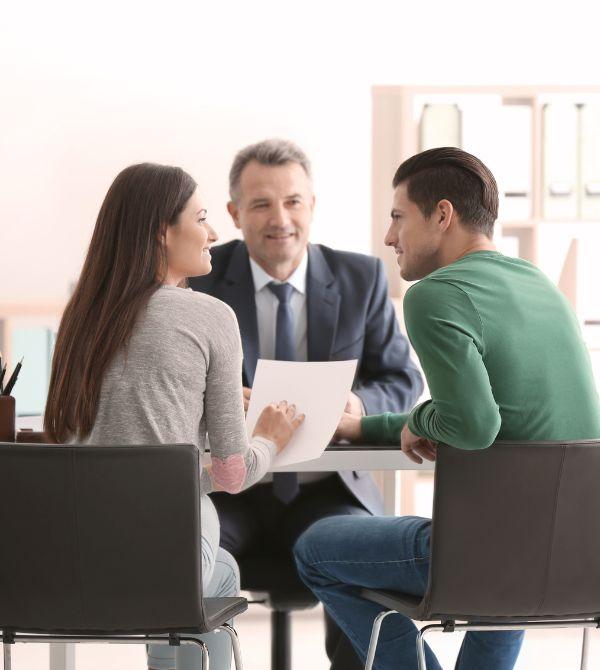 Couple meeting with mortgage lender