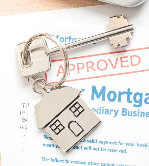 mortgage paperwork and key