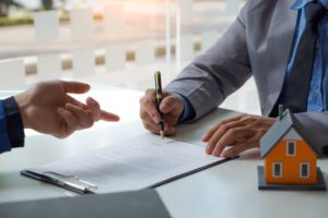 mortgage broker writing something