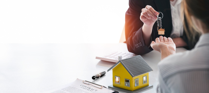 loan and mortgage agent and homeowner discussing home loan