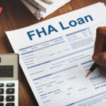 Client signing FHA Loan papers