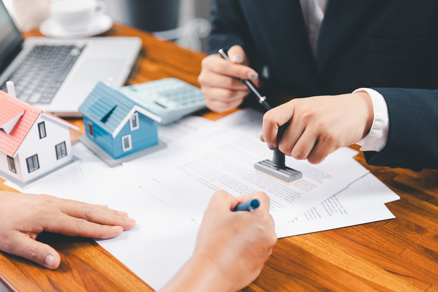 mortgage loan lender stamping mortgage papers