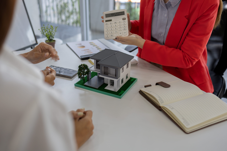 Signing a property loan and sale agreement